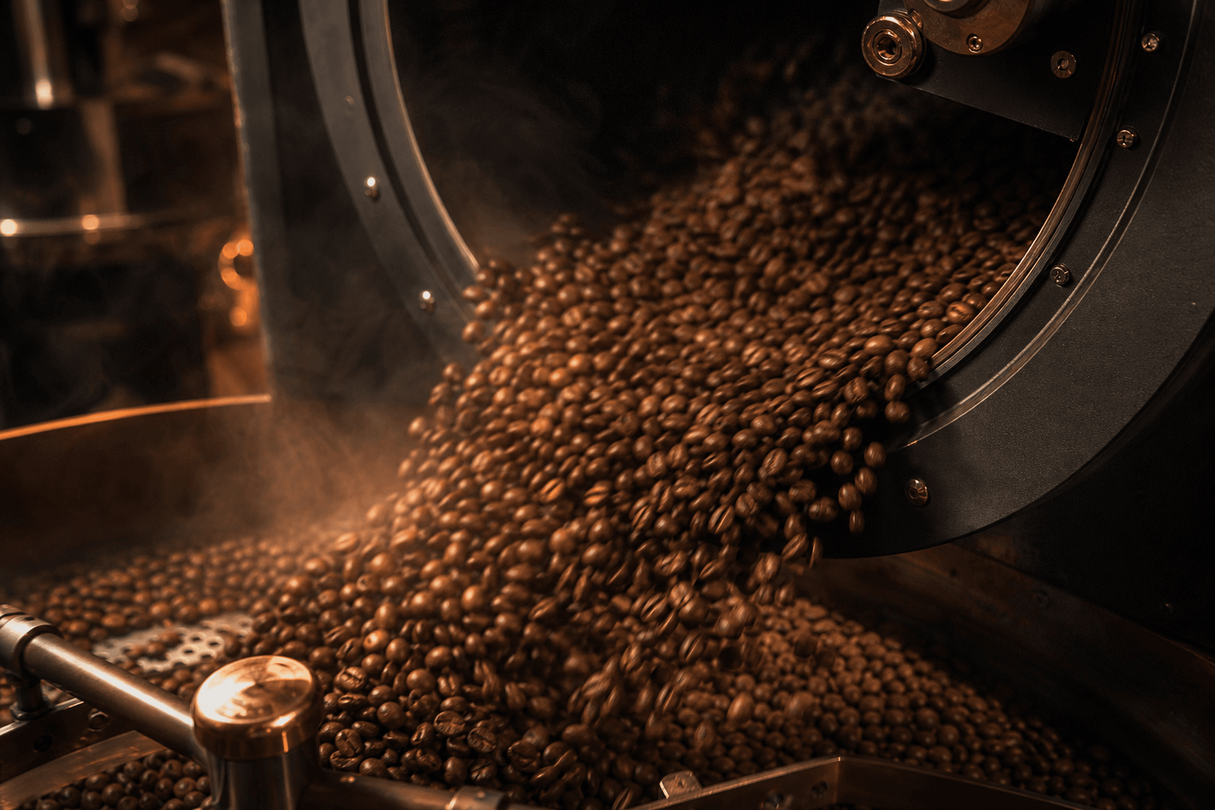 Coffee beans tumbling inside a drum roaster with motion blur.